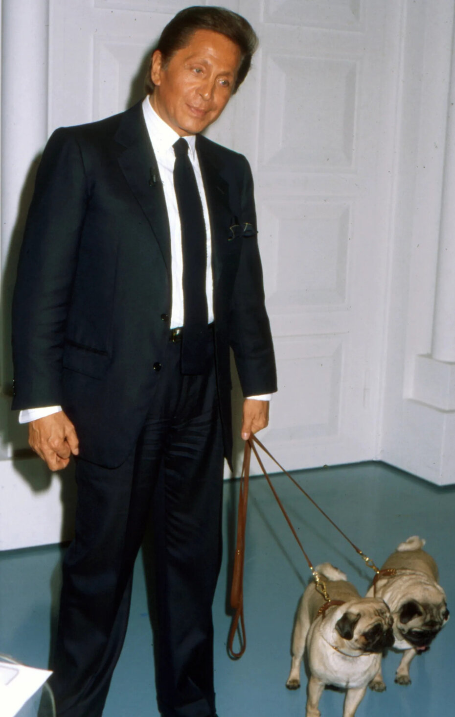 O designer italiano era apaixonado pelos c&atilde;es da ra&ccedil;a Pug (Foto: Getty Images)